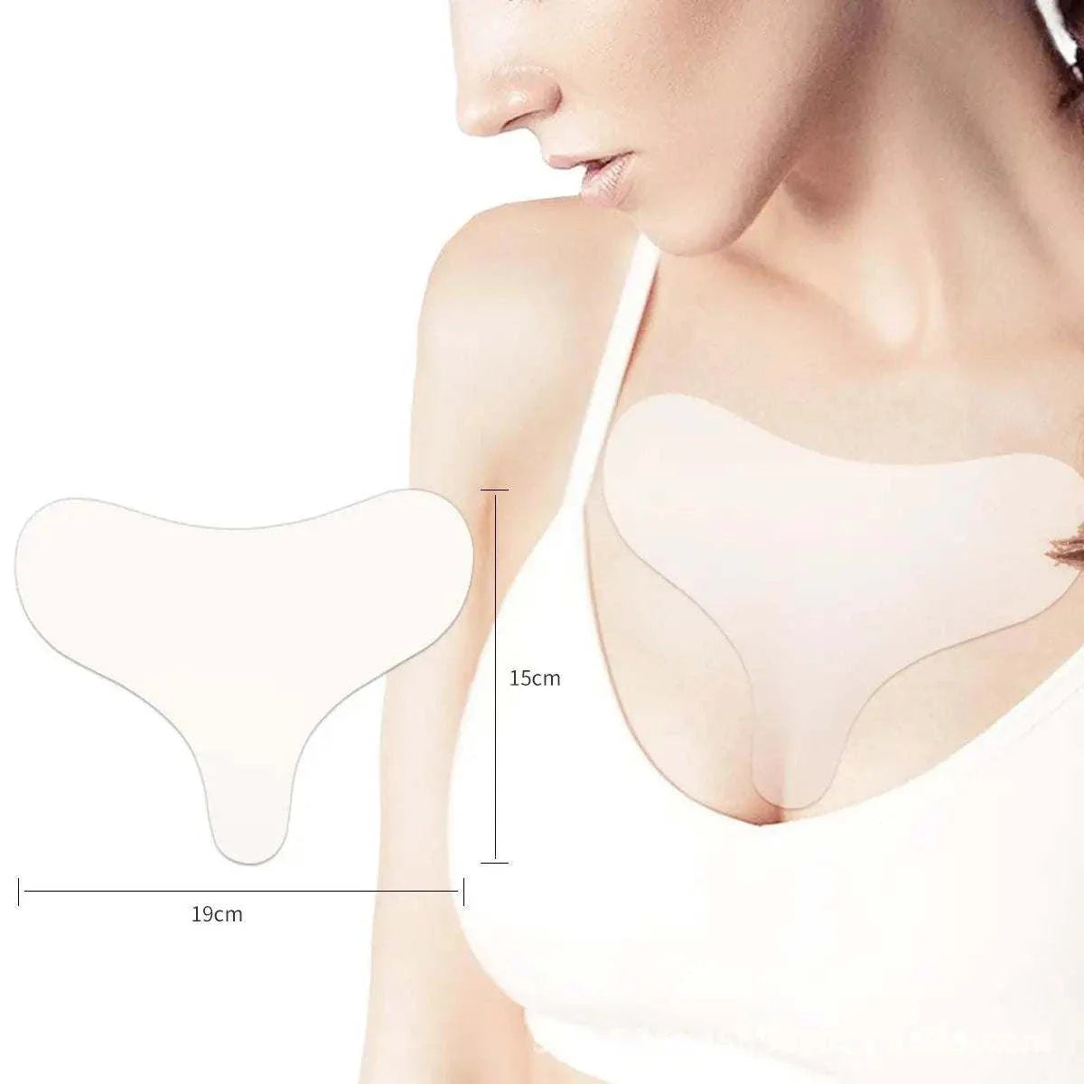 Silicone anti wrinkle patches applied on woman's décolleté for smoothing skin and reducing wrinkles