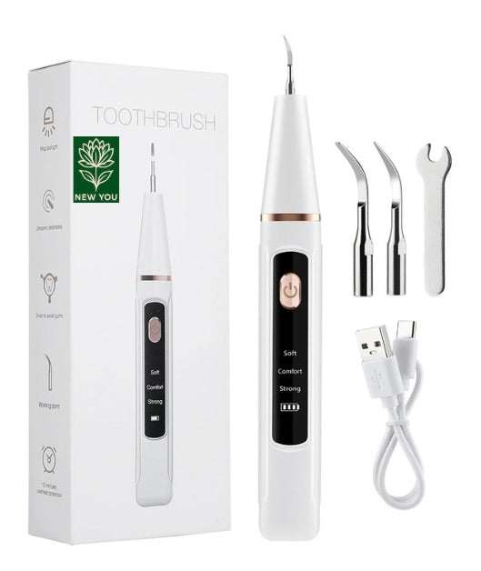 Electric dental scaler with ergonomic handle, multiple tips, and USB charging for plaque and tartar removal at home
